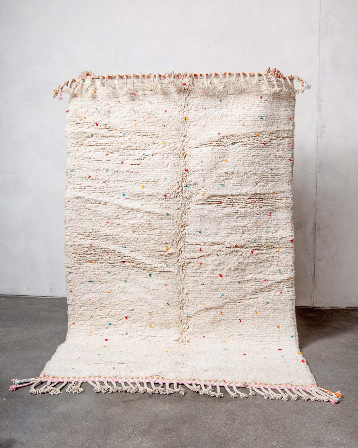 Modern, designer, handcrafted Berber rug from Morocco. Beniourain carpet with beautiful colours and patterns and fluffy wool texture.
